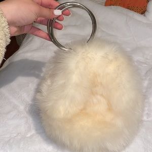 Small fluffy white purse